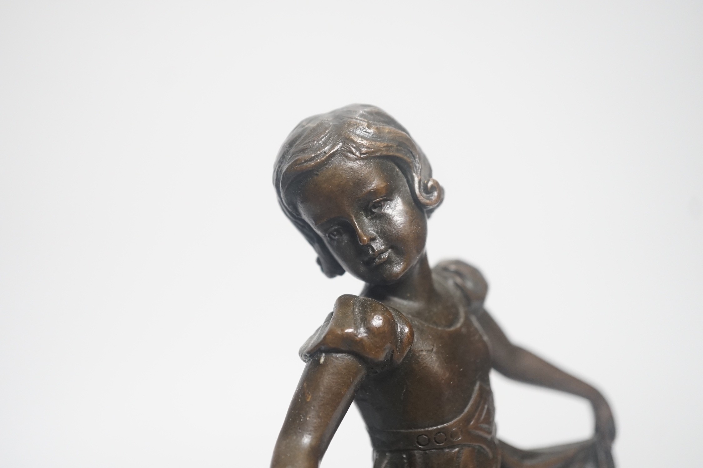 After Ferdinand Preiss (1882-1943), a bronze of a curtsying girl, on marble base, 27cm